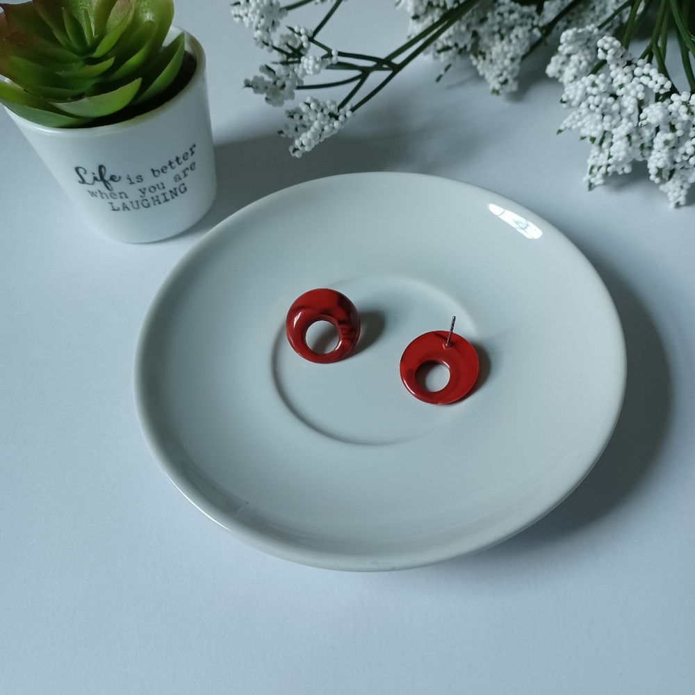 Round red acrylic studs